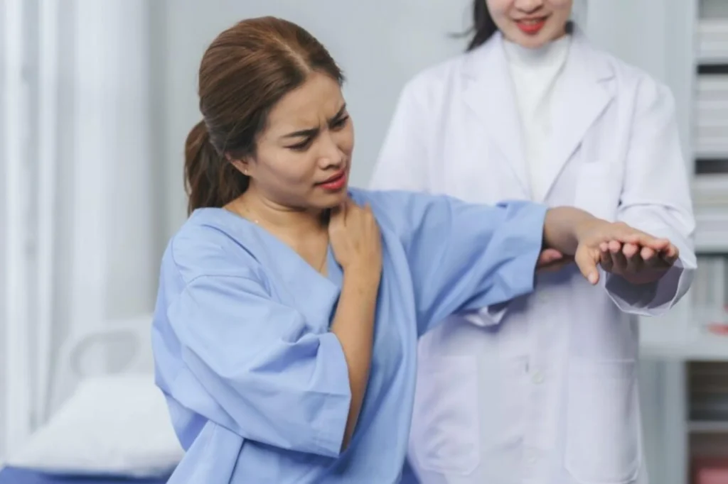 Woman lifting shoulder